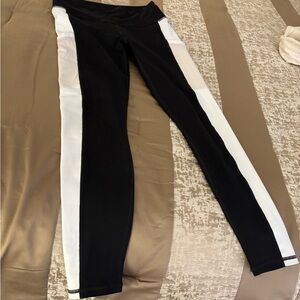 Fabletics Women's Black Leggings with Broad white stripe.